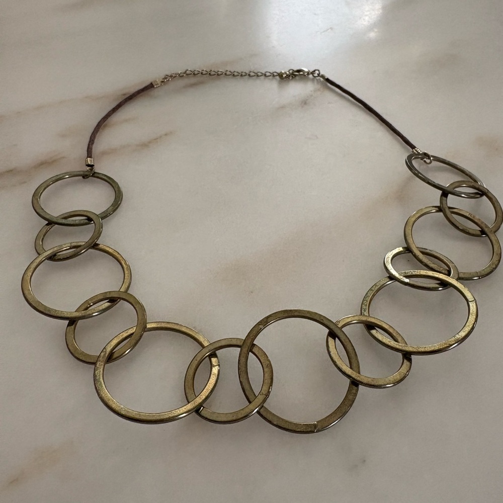 Retro metal necklace with leather cording